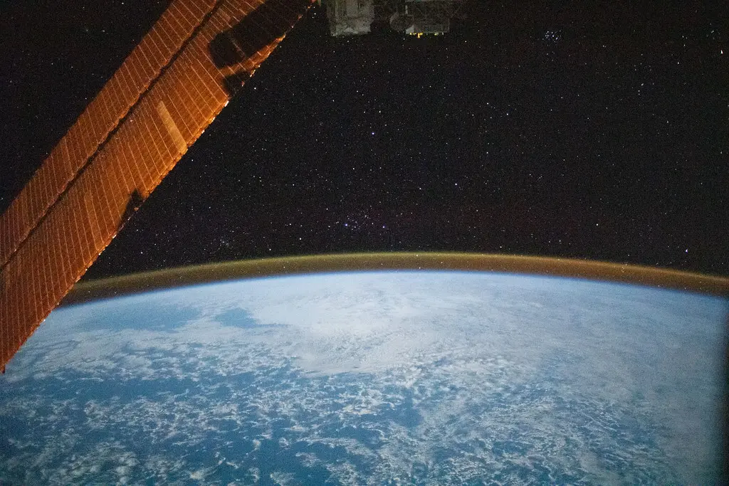 A starry sky above the Earth's atmospheric glow